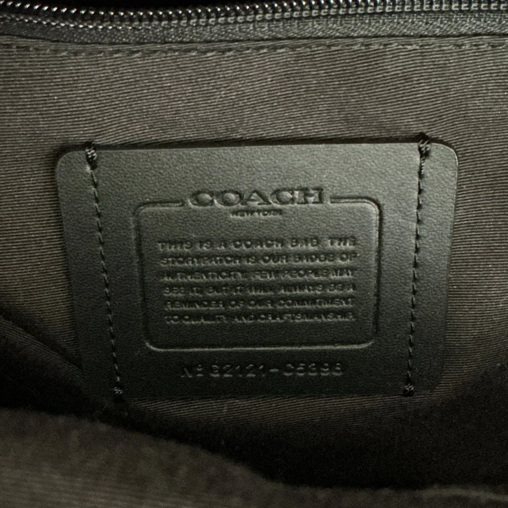 Coach Backpack in Black with Blue Accents